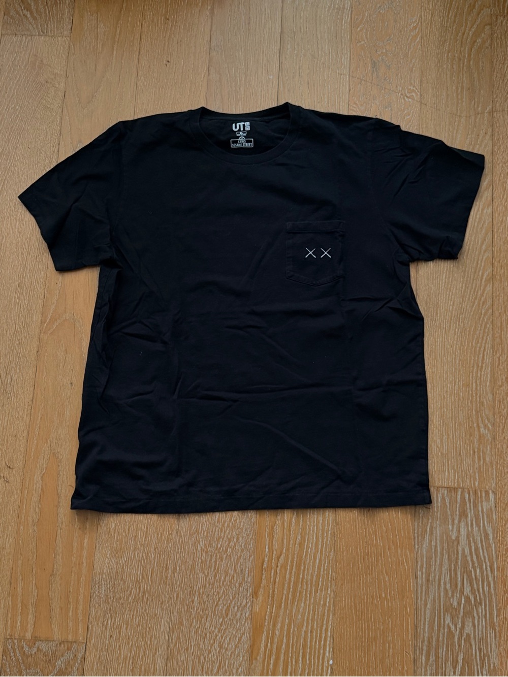 Uniqlo x KAWS Black Pocket Tee with X Stitch